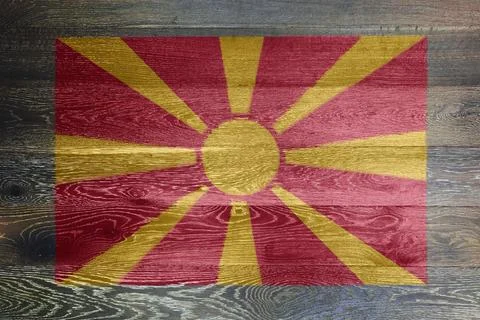 North Macedonia flag on rustic old wood Stock Illustration