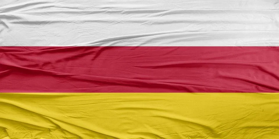 North Ossetia Flag Soft Breeze Air Fabric Wave Closeup Stock Photos
