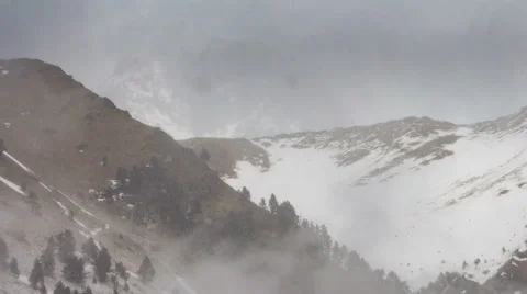 North Ossetia. The movement of clouds in the snowy Caucasus mountains in winter 動画素材 61453247