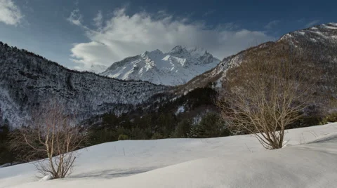 North Ossetia. The movement of clouds in the snowy Caucasus mountains in winter. 動画素材 61454005