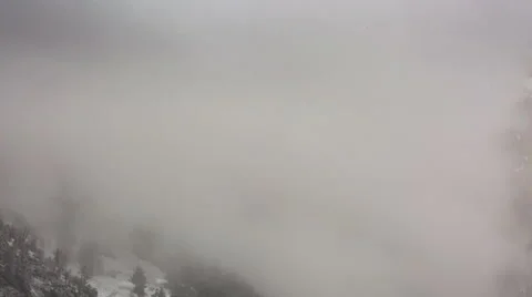 North Ossetia. The movement of clouds in the snowy Caucasus mountains in winter 動画素材 61456239