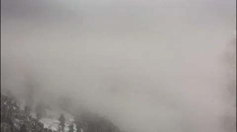 North Ossetia. The movement of clouds in the snowy Caucasus mountains in winter. Vídeos de archivo 61456537