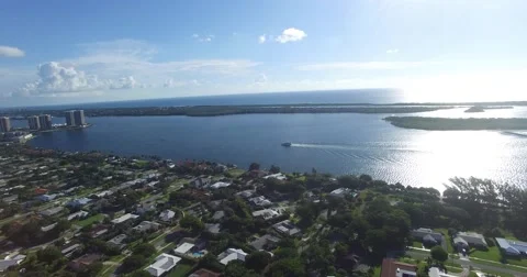 North Palm Beach Lighthouse Dr East With Boat Video stock 65049352