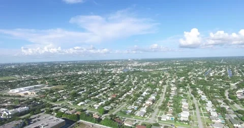North Palm Beach Lighthouse Drive West Pan at birds eye view Stock Footage 65049405