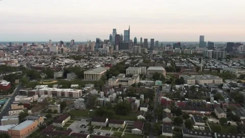 North Philadelphia drone during dusk on an overcast cloudy day approaching Stock Footage 241210341