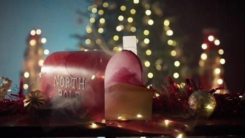 North Pole Mailbox with Letters Surrounded by Festive Holiday Decorations Stock Footage 331106974