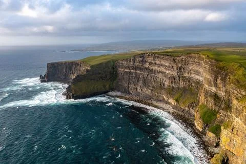 North Side of Cliffs of Moher Bathed in Sunset Light Stock Photos