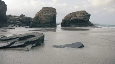 North Spain beach on a rainy grey winter day, high tide sea. 스톡 동영상 169748652