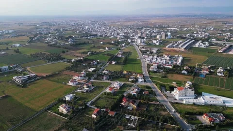 Northern Cyprus. Drone. Buildings, fields and the sea. City life. Tourists. Stock Footage 231783815