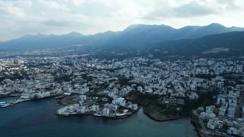 Northern Cyprus. Drone of mountains, sunlight, ocean. Beautiful beach. Ships Stock Footage 231114073