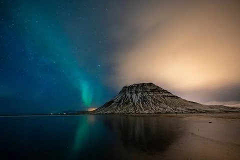 Northern Light, Aurora borealis at Kirkjufell in Iceland. Kirkjufell mountains Stock Photos