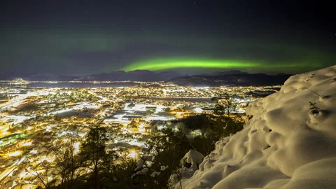 Northern light in light pollution Stock Footage 250420663