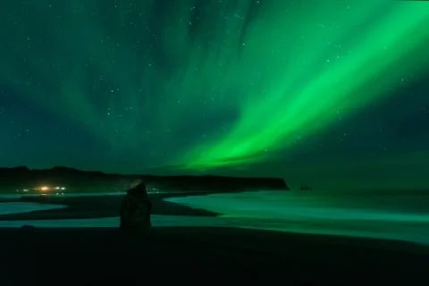 The Northern Light at the Vik Cliffs Iceland. Landscape of Vik beach; with gr Stock Photos
