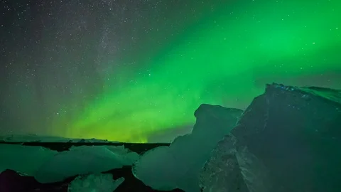 Northern Lights Hyperlapse Over Icebergs on Diamond Beach Stock Footage 126198965