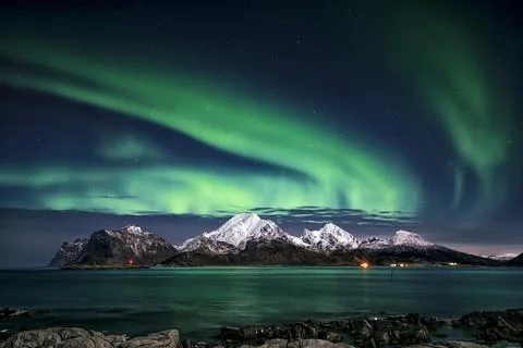 Northern lights over Mt Himmeltinden, Vestvagoy,  Lofoten, Nordland, Norway Stock Photos
