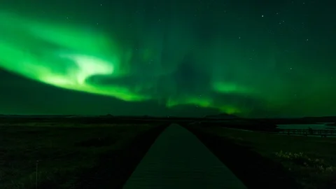 Northern lights on a road Stock Footage 118087827