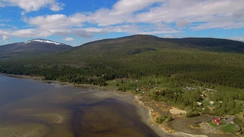Northern river flows into the sea. The span of the drone over shallow water Stock Footage 104577018