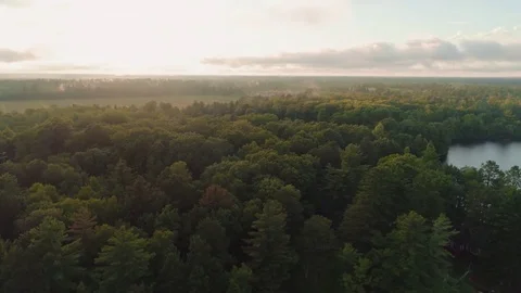 Northern Wisconsin Sunset over Lake and Forest Aerial Drone Stock Footage