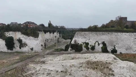 Northfleet Kent UK old Chalk quarry low drone view Stock Footage 291887073