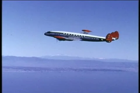 NORTHWEST AIRLINES, 1950s, Lockheed Constellation, vintage aerial Stock Footage 12878068