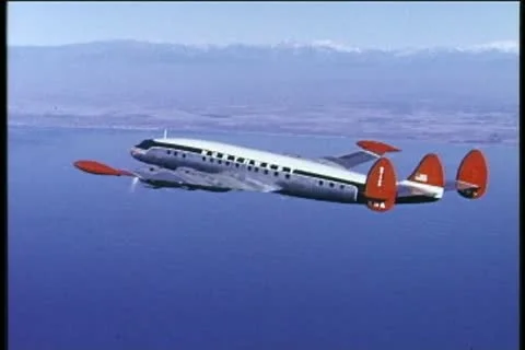 NORTHWEST AIRLINES, 1950s, Lockheed Constellation, vintage aerial Stock Footage 12883438