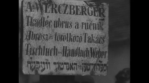 Norway 1940s: A man with a beard and hat stands in front of an industrial Stock Footage 342036637