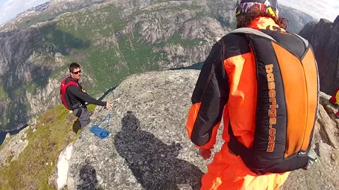 Norway base jumping aerobatics Stock Footage 273016351