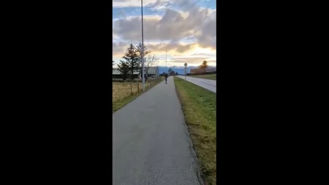 Norway: E-scooter flyby ends in collision after spectator stands too clos... Stock Footage 341474906