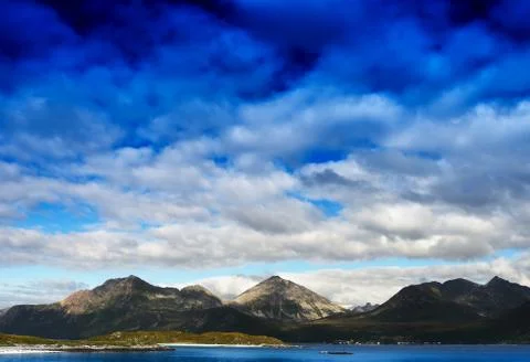 Norway mountains with dramatic clouds landscape background Stock Photos