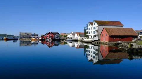 NORWAY Rennesoy Island waterfront and fishing boat Stock Photos