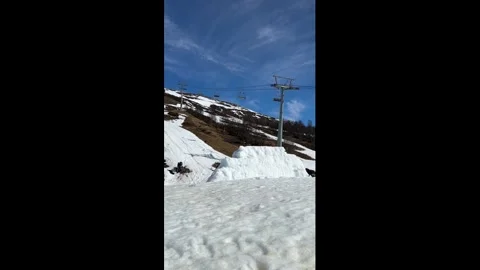 Norway: Snowmobile backflip attempt disrupted by strong winds in Oppdal, ... Stock-Footage 334157639