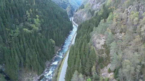 Norway’s Turquoise River Flowing Through Green Landscapes | Drone Footage Stock Footage 323378507