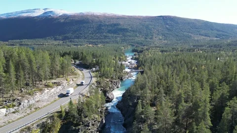 Norway’s Turquoise River Flowing Through Green Landscapes | Drone Footage Stock Footage 323378845