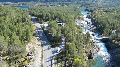 Norway’s Turquoise River Flowing Through Green Landscapes | Drone Footage Stock Footage 323378899