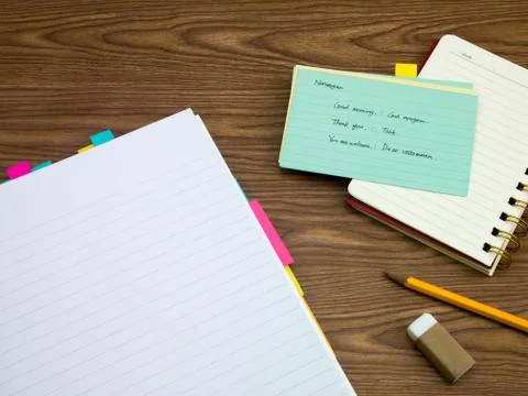 Norwegian; Learning New Language Writing Words on the Notebook Stock Photos