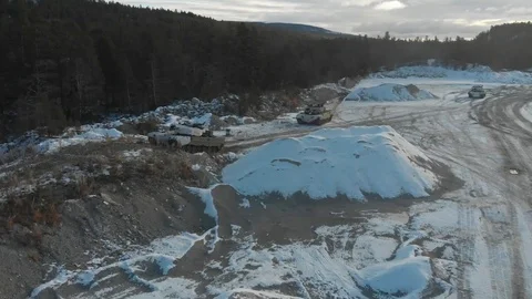 Norwegian Leopard II Main Battle Tanks maneuver over terrain - 2018 Stock Footage 106143157