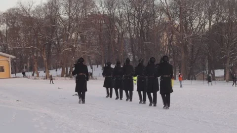 Norwegian Royal Guard Marching Through Snowy Slottsparken Park in Winter, Oslo Stock Footage 339759286