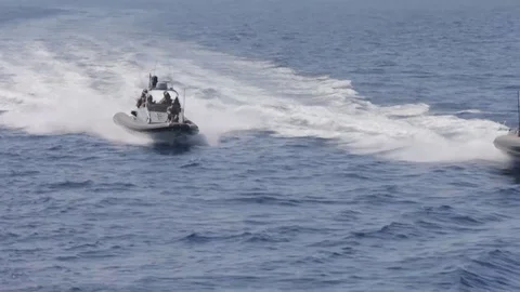 Norwegian Special Forces attack on two combat boats Stock Footage 120948179