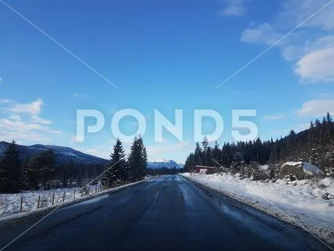 Norwegian winter landscapes with mountains and roads Stock Photos