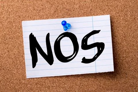 NOS - teared note paper pinned on bulletin board Foto stock