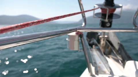 Nose part of ship on waves. Move forward on sea in great white sailing yach Stock Footage 99695804