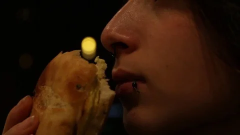 Nose sniffing food, taking a bite Stock Footage 78894151