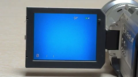 Nostalgic Camcorder Rewinds Tape Creating A High Pitched Mechanical Whir Stock Footage 328694477