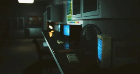 Nostalgic computer setup in a dimly lit room with retro technology Stock Footage 307759783