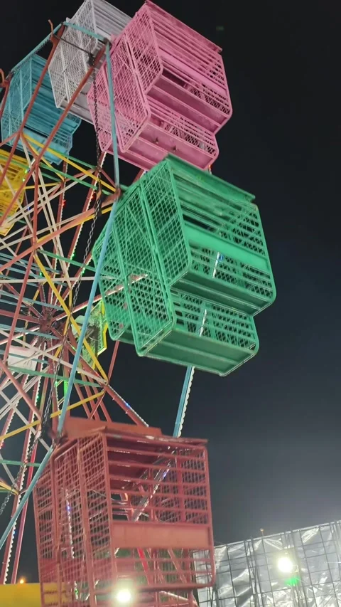 Nostalgic Funfair Ride with Retro Lights and Classic Carnival Atmosphere Stock Footage 321067105