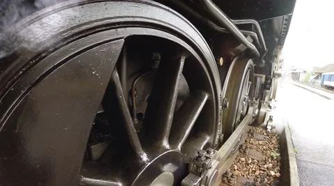 Nostalgic retro transportation background. steam engine train locomotive Stock Footage 64540348