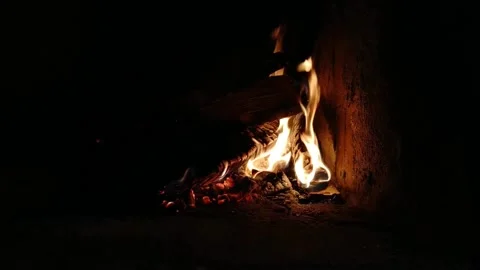 Not a big flame of fire in the fireplace on the right. Stock Footage 168768214