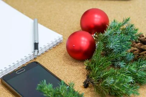 Not completed list of goals in a notebook on a wooden table with Christmas Stock Photos
