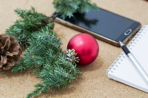 Not completed list of goals in a notebook on a wooden table with Christmas Stock Photos