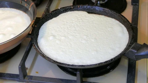 Not an inverted pancake in a pan Stock Footage 123587726